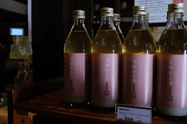 Hida Takayama's local specialties: Sake and Amazake bottles in wooden crates